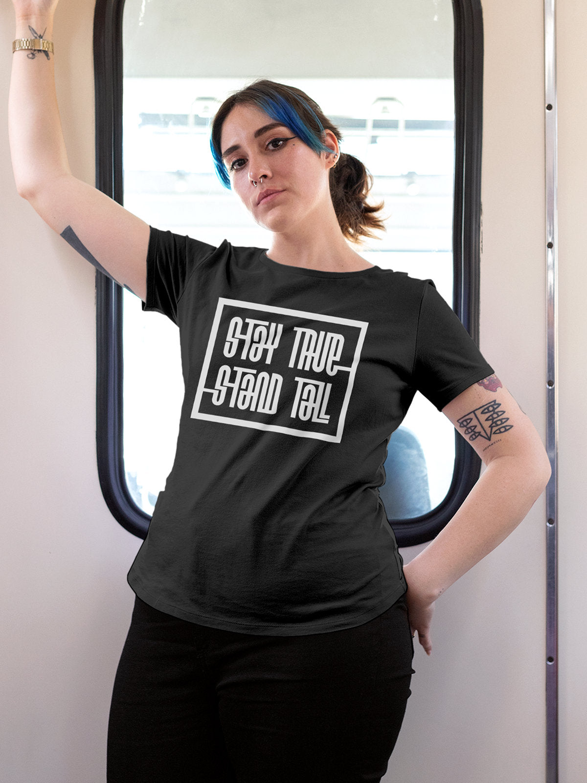 Model wearing Women's Dark Grey Round Neck T-shirt with 'Stay True Stand Tall' design, offering effortless style and premium comfort