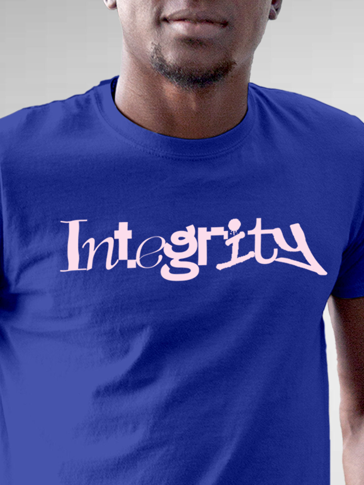 Close up of 'Integrity' design on Men's Blue Round Neck T-shirt, highlighting intricate details and vibrant print.