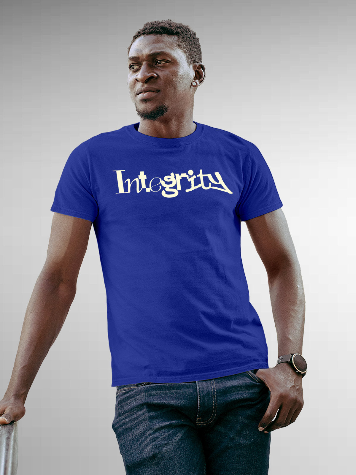 Model wearing Men's Blue Round Neck T-shirt with 'Integrity' design, offering effortless style and premium comfort