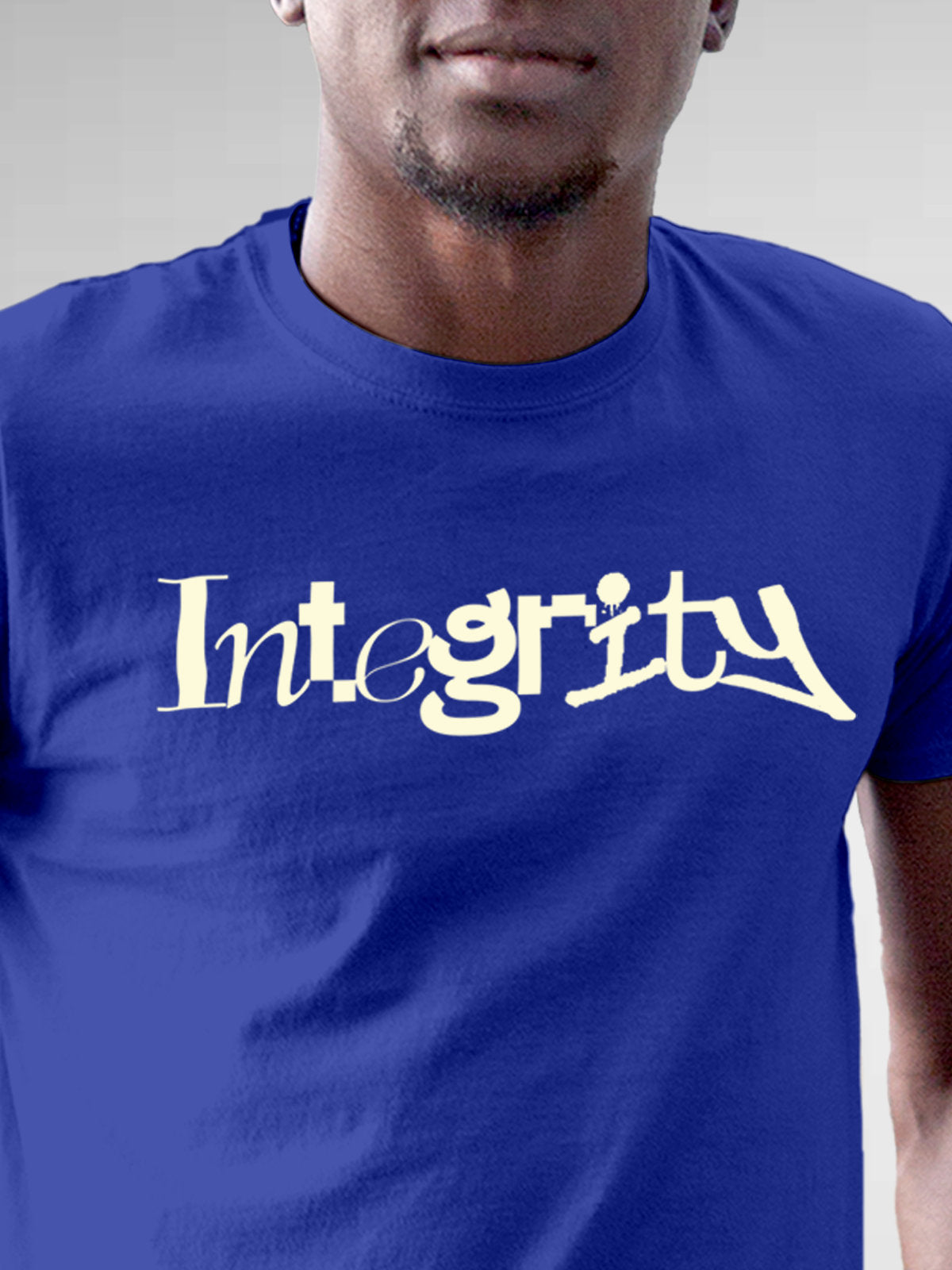 Close up of 'Integrity' design on Men's Blue Round Neck T-shirt, highlighting intricate details and vibrant print.