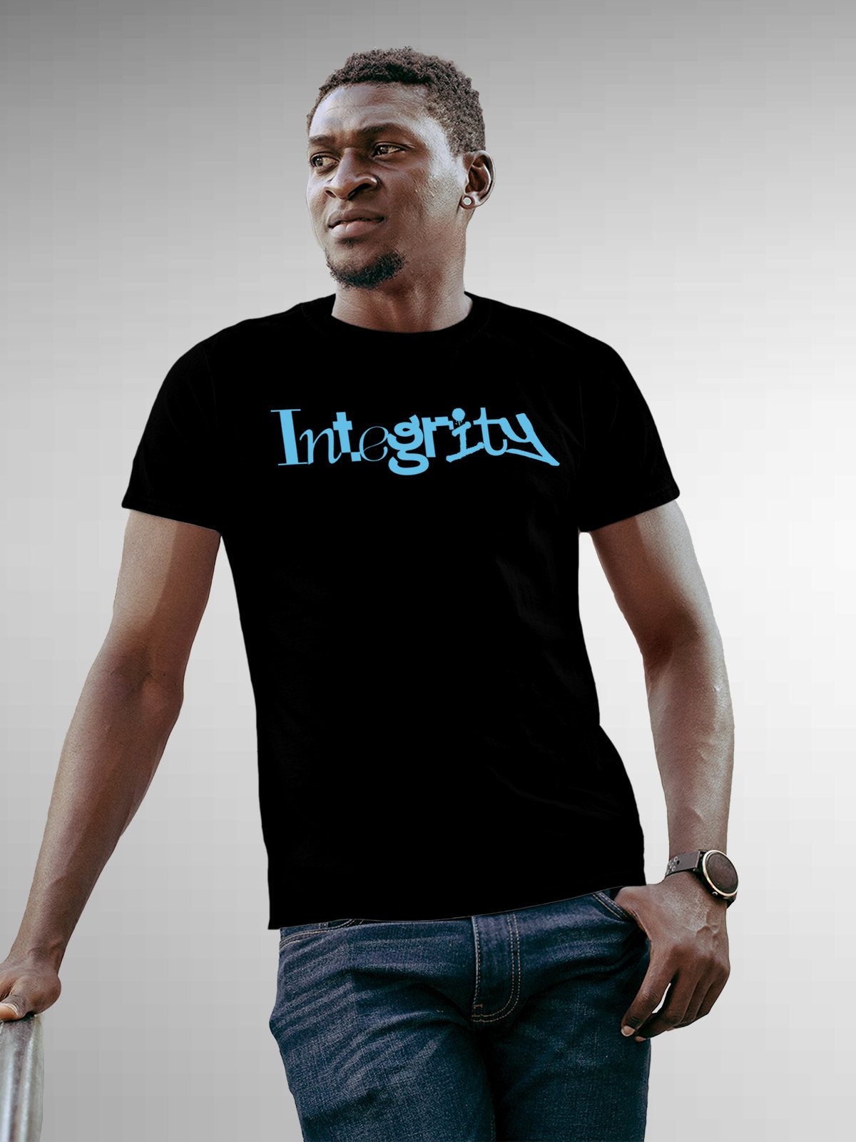 Model wearing Men's Black Round Neck T-shirt with 'Integrity' design, offering effortless style and premium comfort