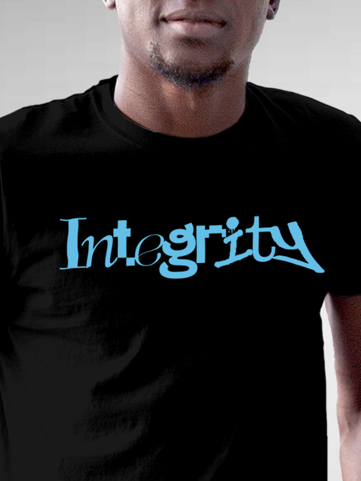 Close up of 'Integrity' design on Men's Black Round Neck T-shirt, highlighting intricate details and vibrant print.