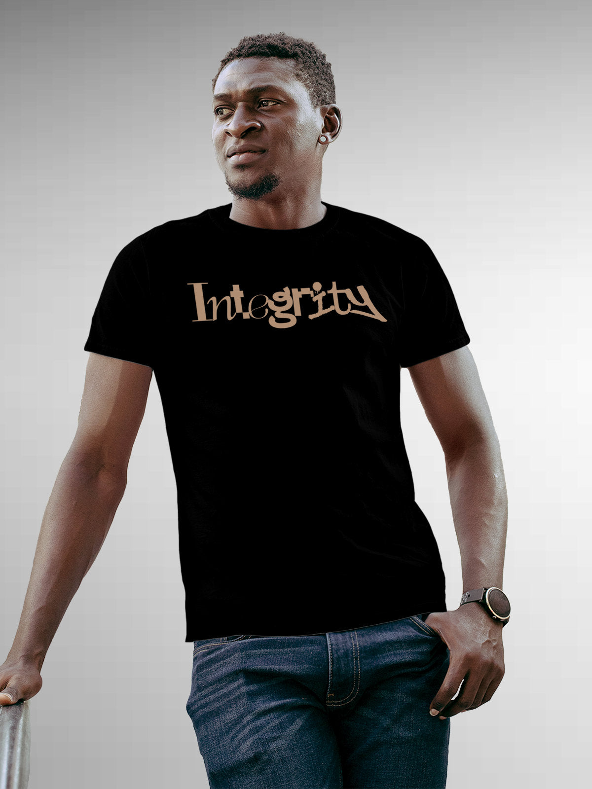Model wearing Men's Black Round Neck T-shirt with 'Integrity' design, offering effortless style and premium comfort