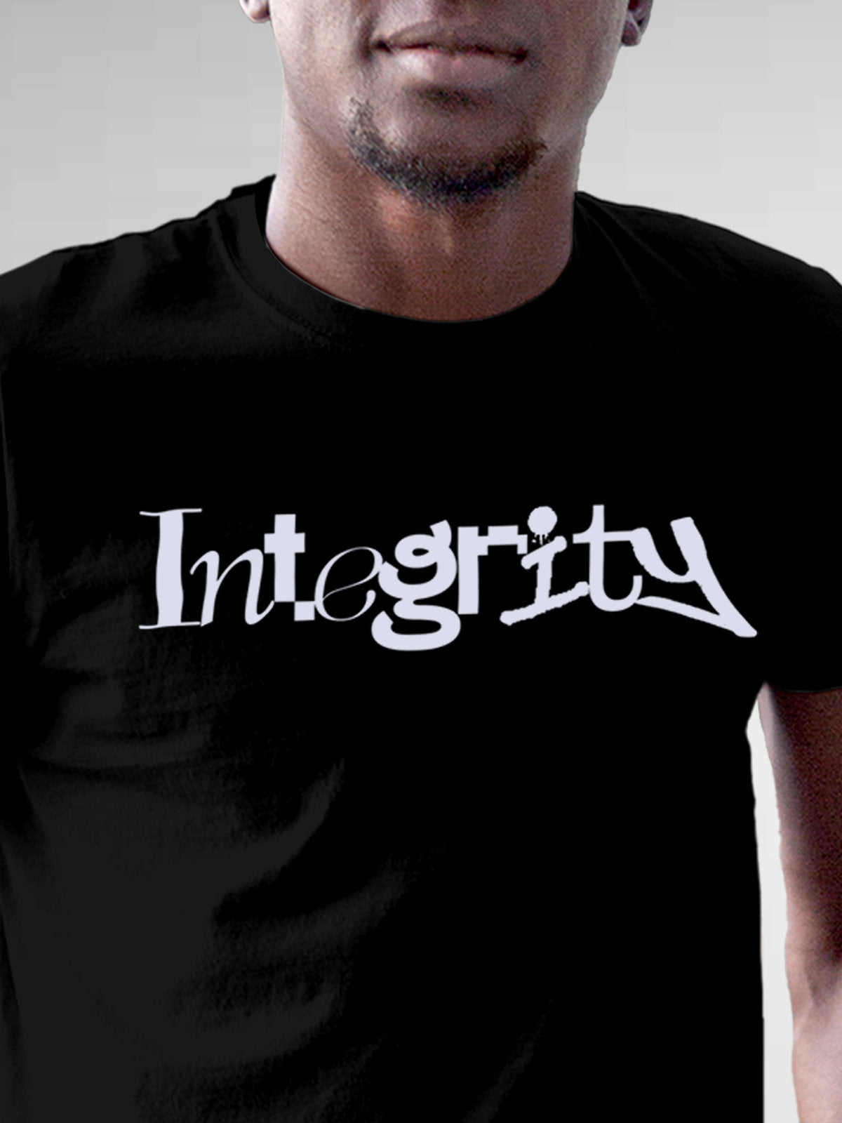 Close up of 'Integrity' design on Men's Black Round Neck T-shirt, highlighting intricate details and vibrant print.