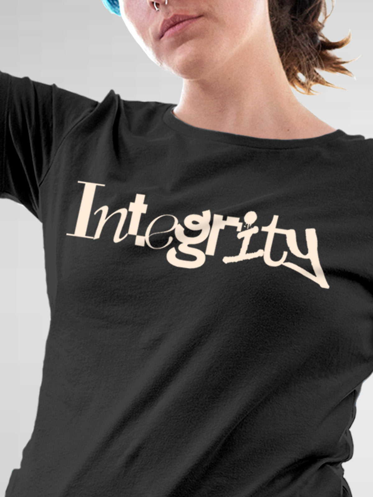 Close up of 'Integrity' design on Women's Dark Grey Round Neck T-shirt, highlighting intricate details and vibrant print.