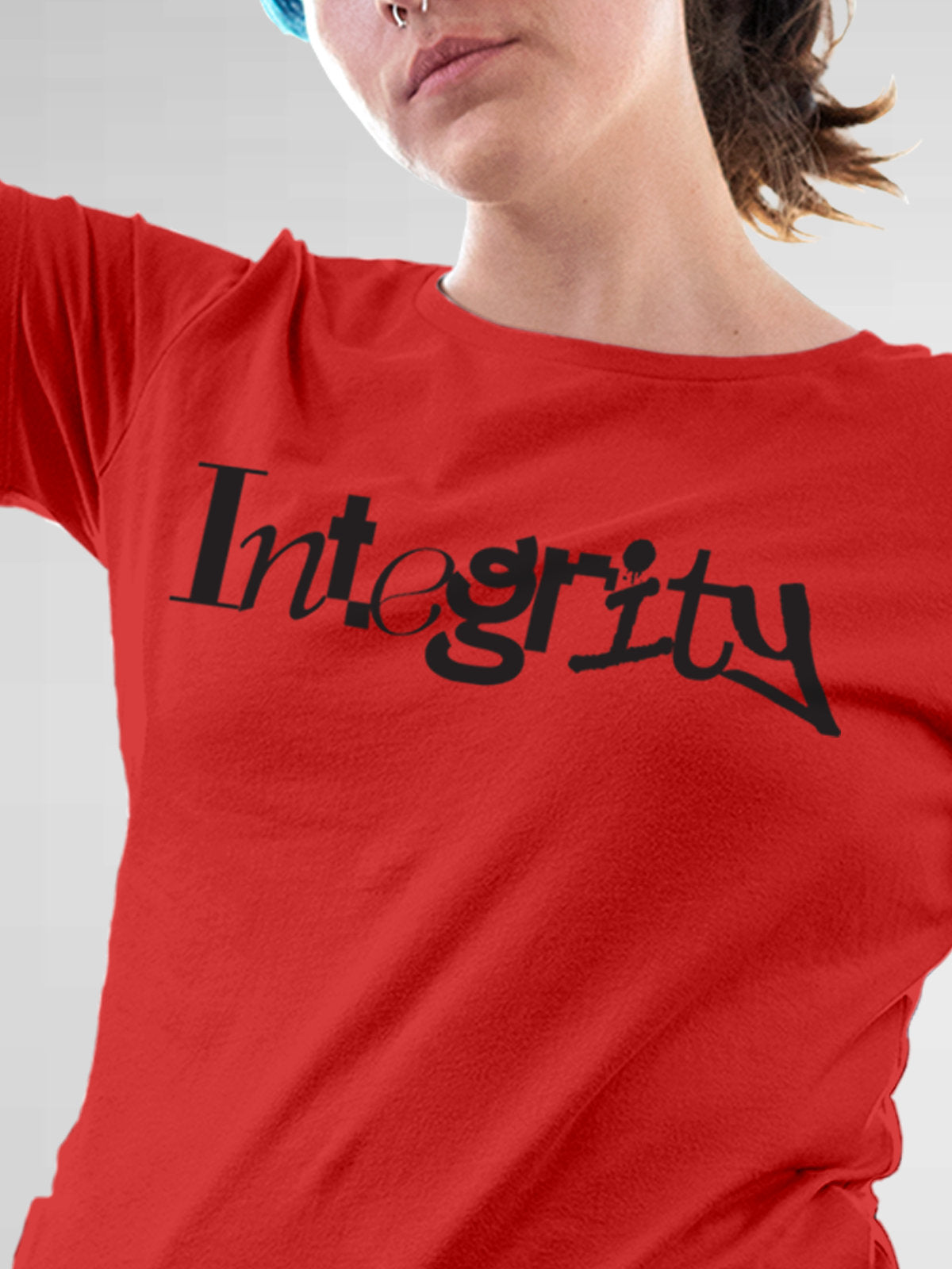 Close up of 'Integrity' design on Women's Red Round Neck T-shirt, highlighting intricate details and vibrant print.