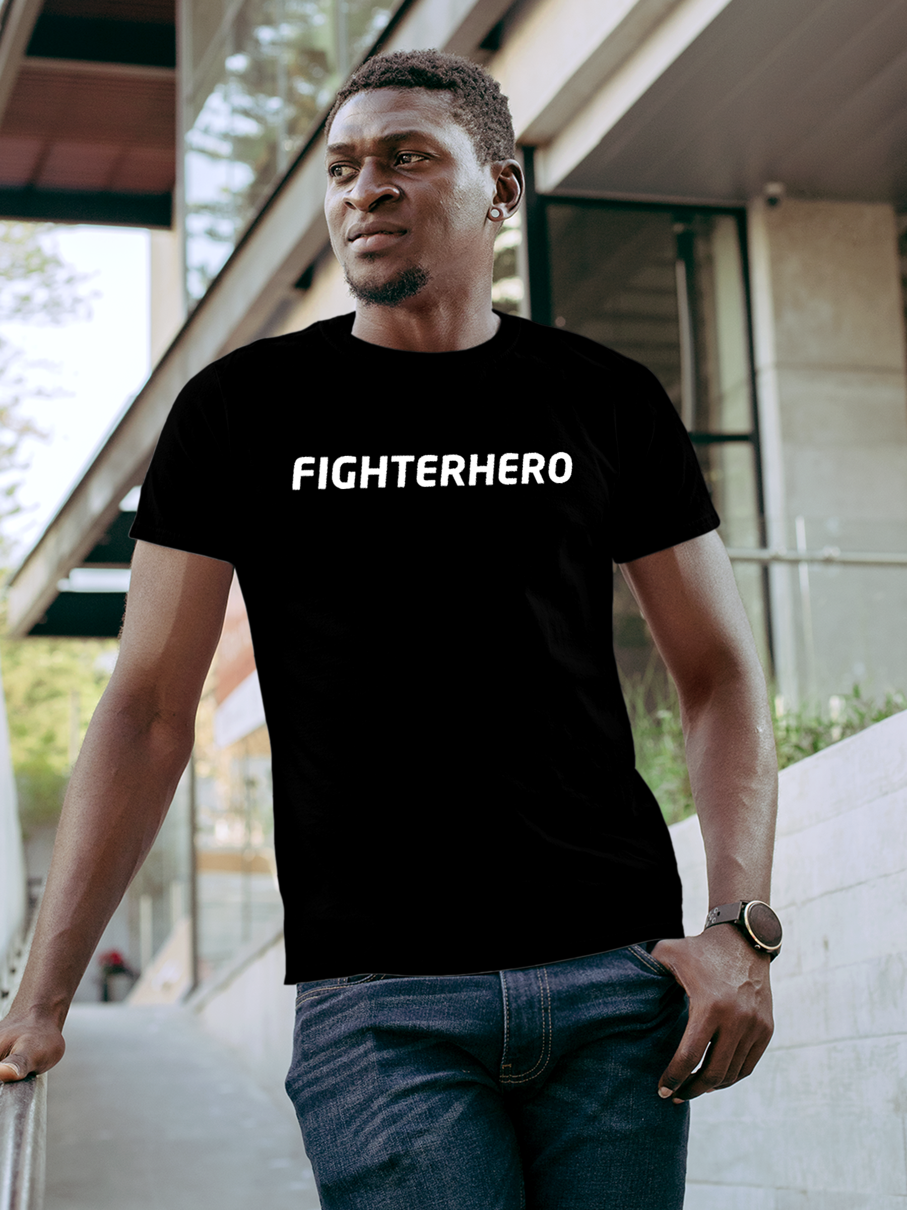 Model wearing Men's Black Round Neck T-shirt with 'Fighterhero' design, offering effortless style and premium comfort