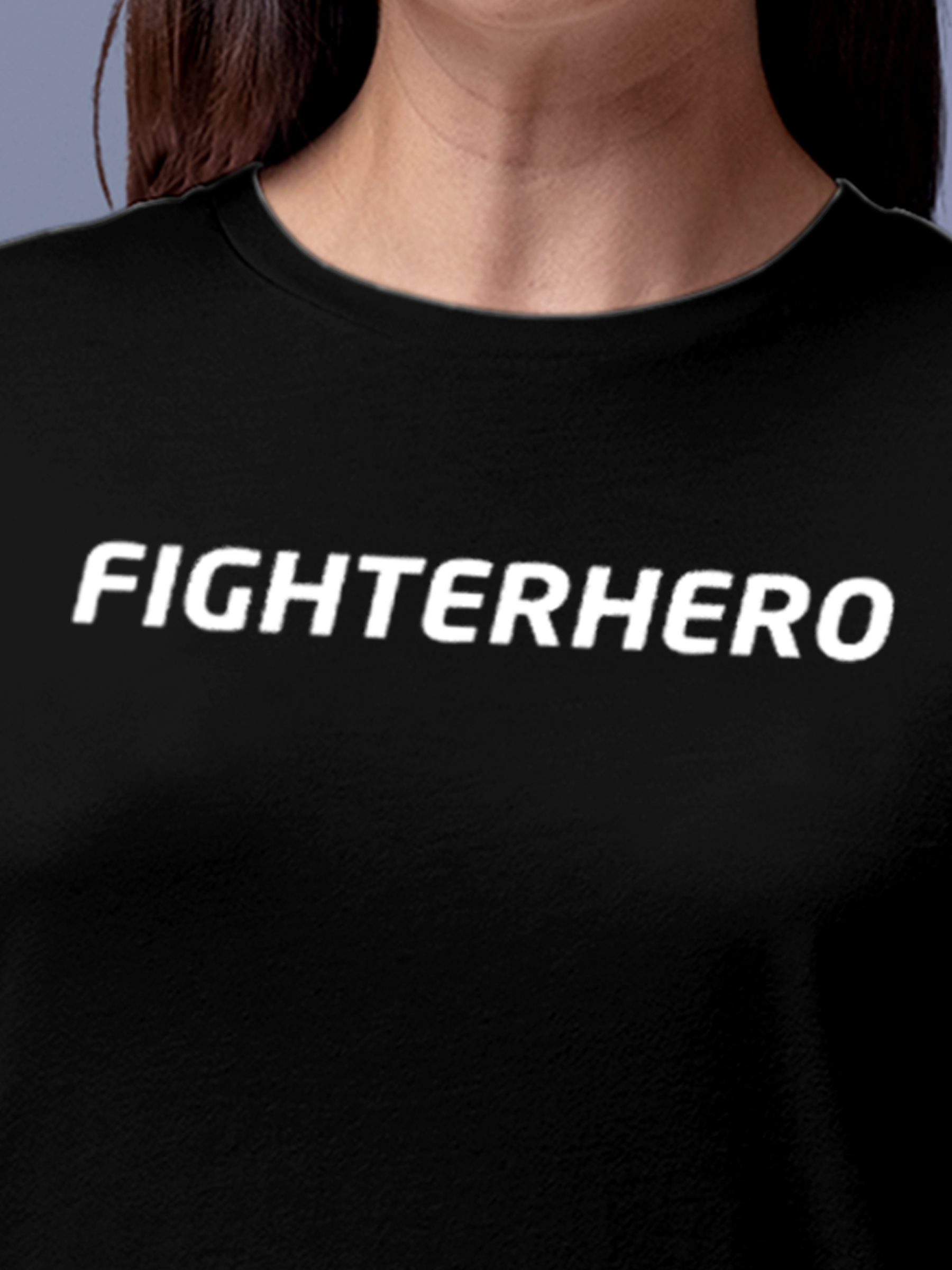 Close up of 'Fighterhero' design on Women's Black Round Neck T-shirt, highlighting intricate details and vibrant print.