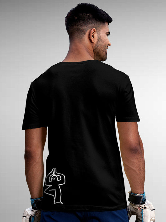 Model wearing Men's Black Round Neck T-shirt with 'Balance Is A Decision' design, offering effortless style and premium comfort