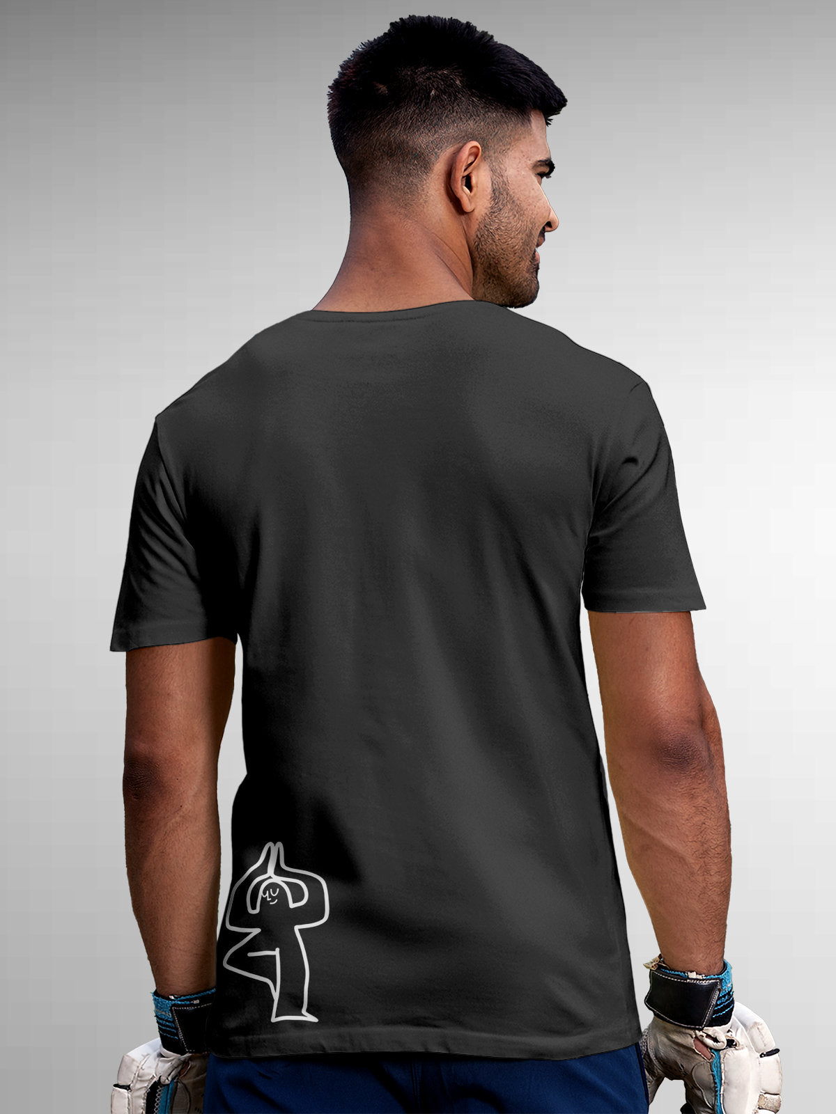 Model wearing Men's Dark Grey Round Neck T-shirt with 'Balance Is A Decision' design, offering effortless style and premium comfort