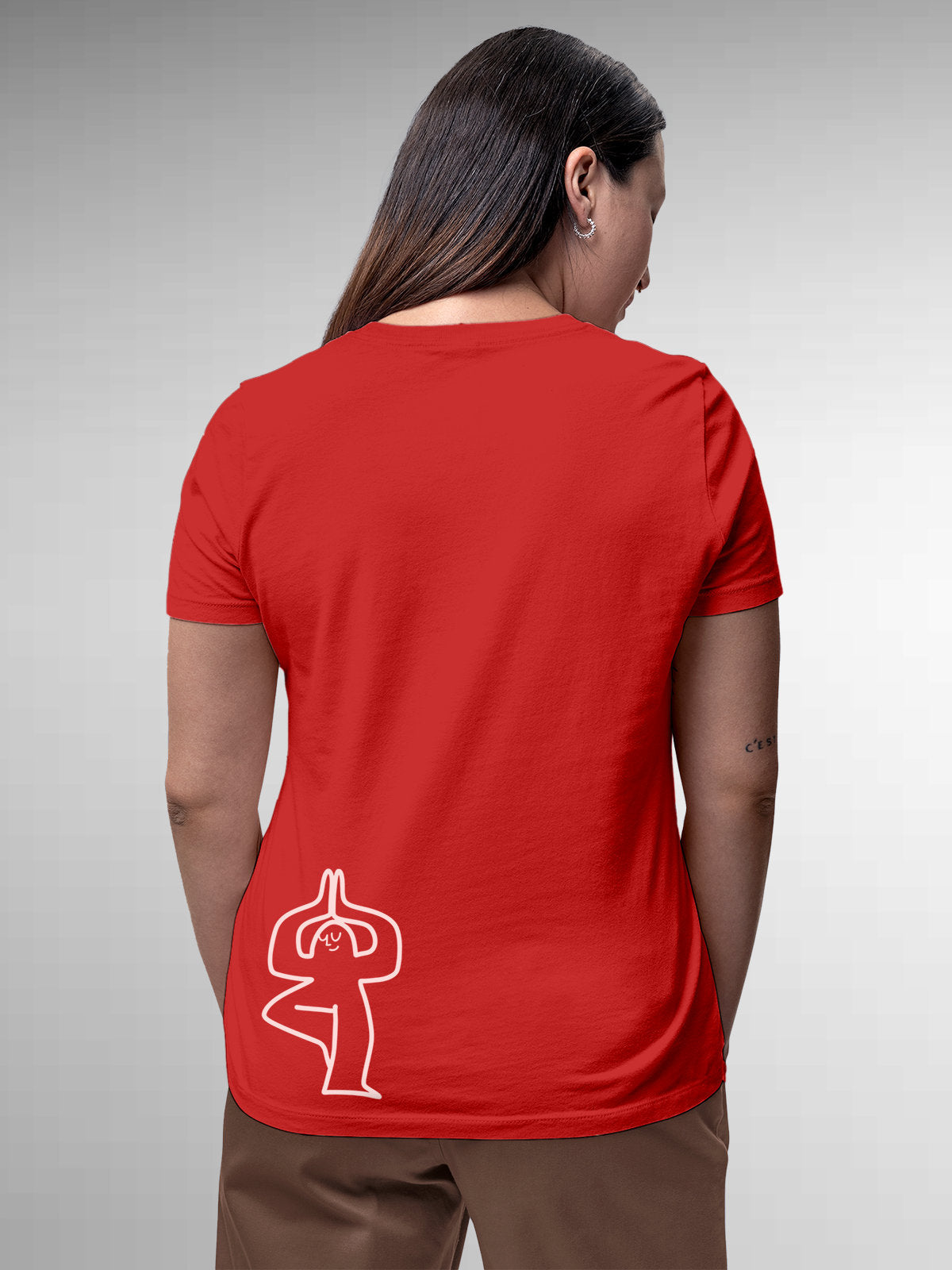 Model wearing Women's Red Round Neck T-shirt with 'Balance Is A Decision' design, offering effortless style and premium comfort