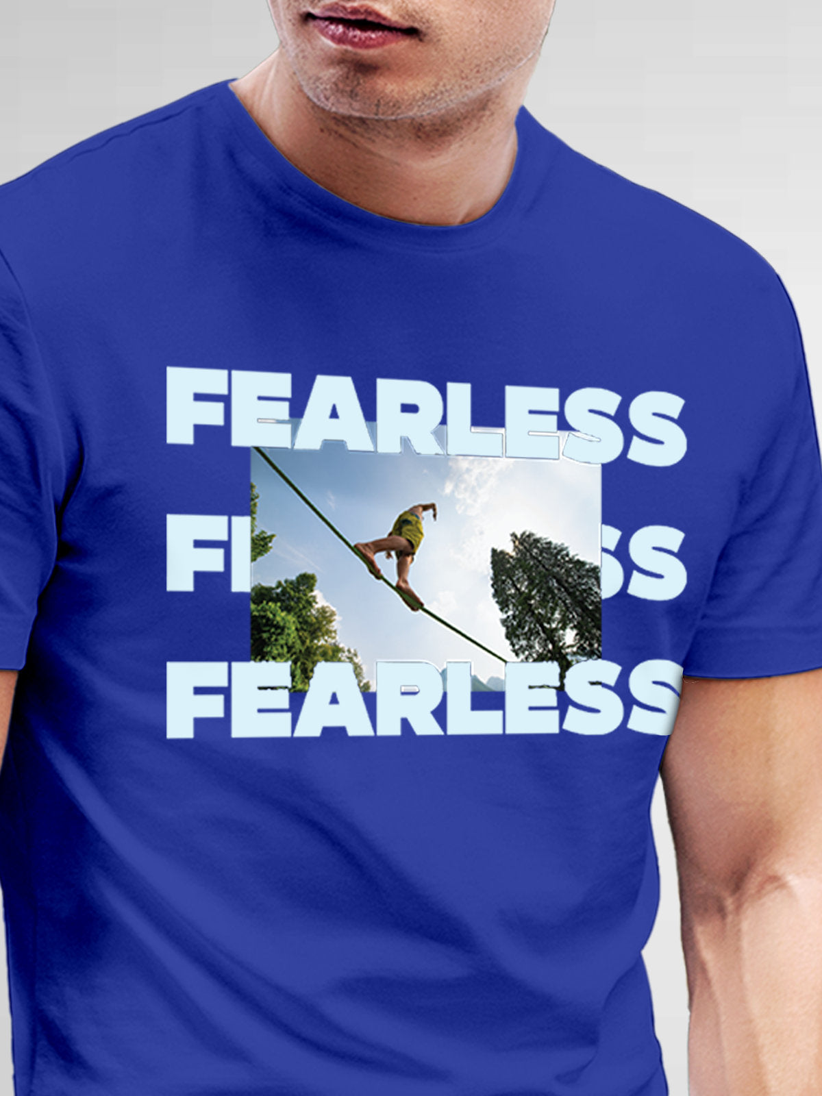 Close up of 'Fearless' design on Men's Blue Round Neck T-shirt, highlighting intricate details and vibrant print.