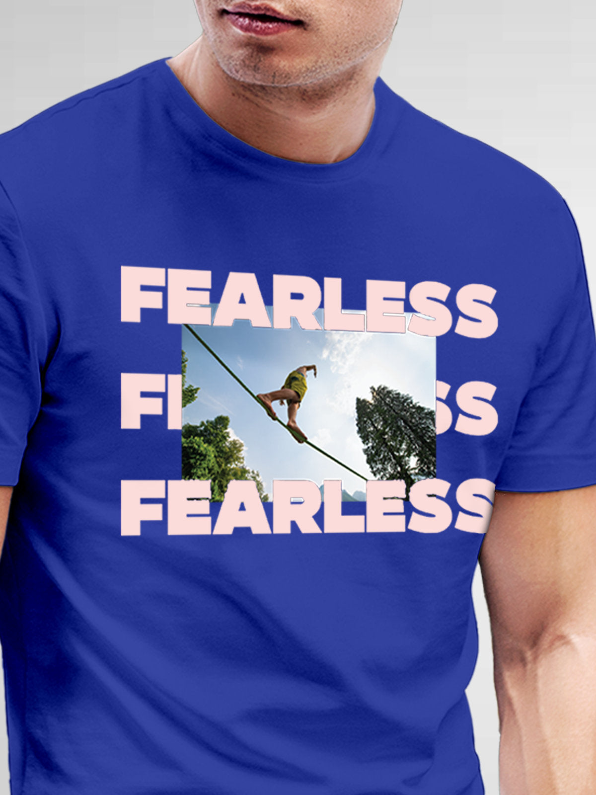 Close up of 'Fearless' design on Men's Blue Round Neck T-shirt, highlighting intricate details and vibrant print.