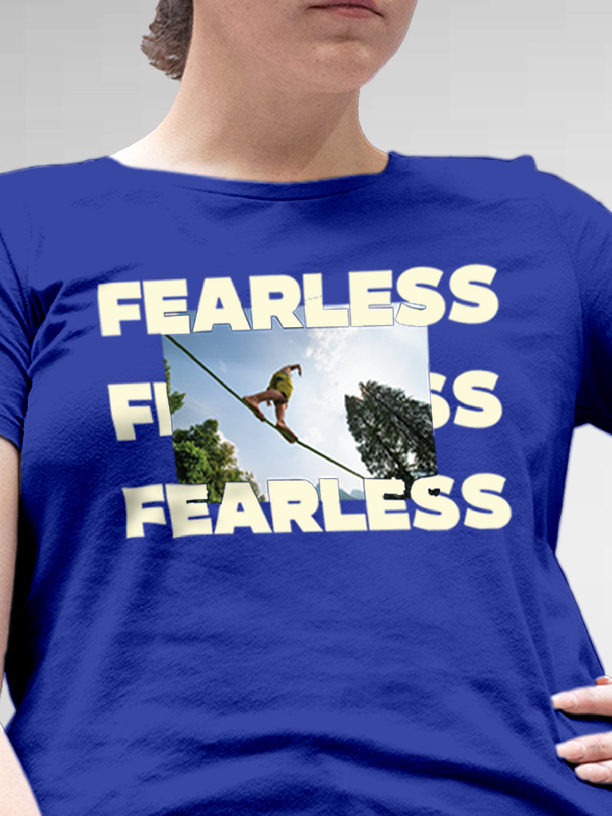 Close up of 'Fearless' design on Women's Blue Round Neck T-shirt, highlighting intricate details and vibrant print.