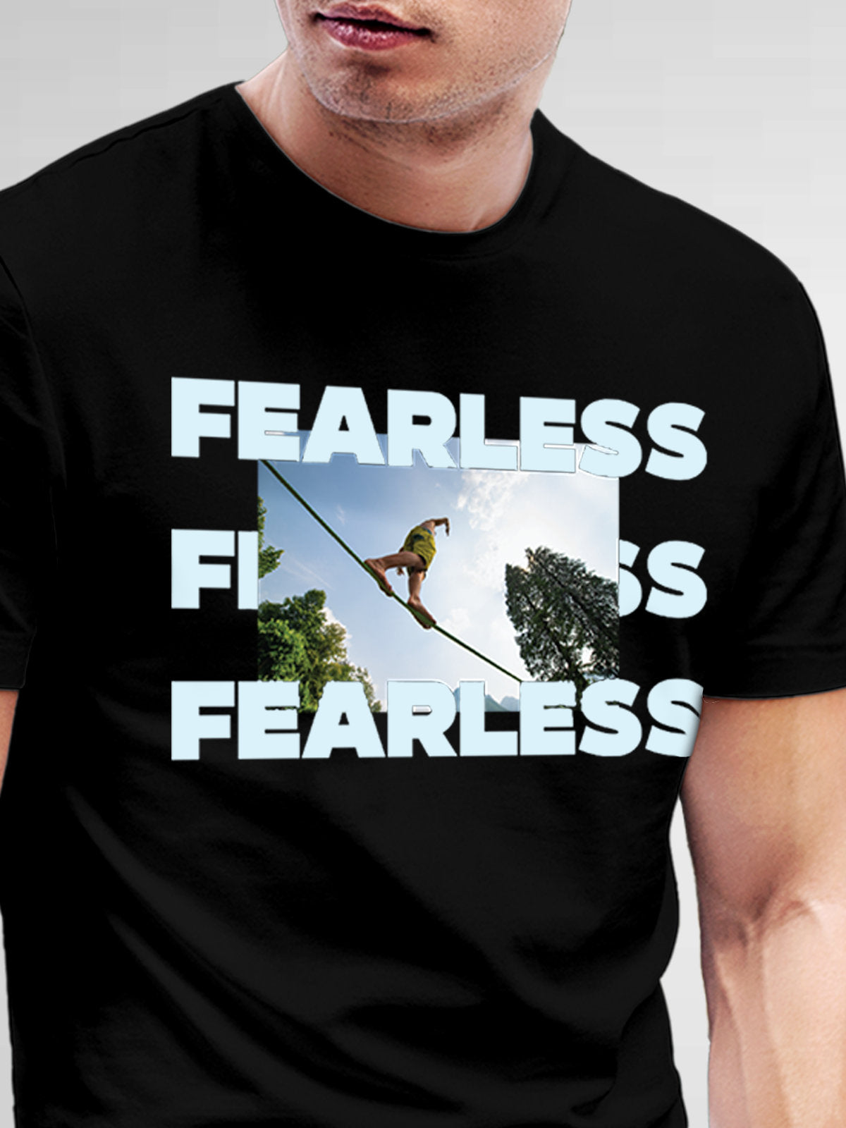 Close up of 'Fearless' design on Men's Black Round Neck T-shirt, highlighting intricate details and vibrant print.