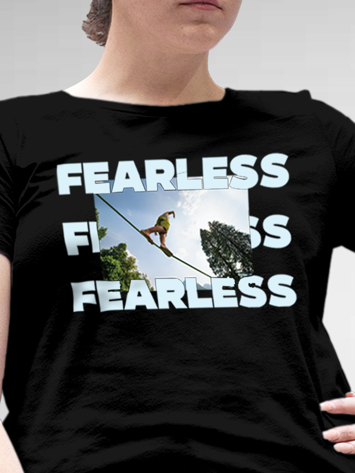 Close up of 'Fearless' design on Women's Black Round Neck T-shirt, highlighting intricate details and vibrant print.