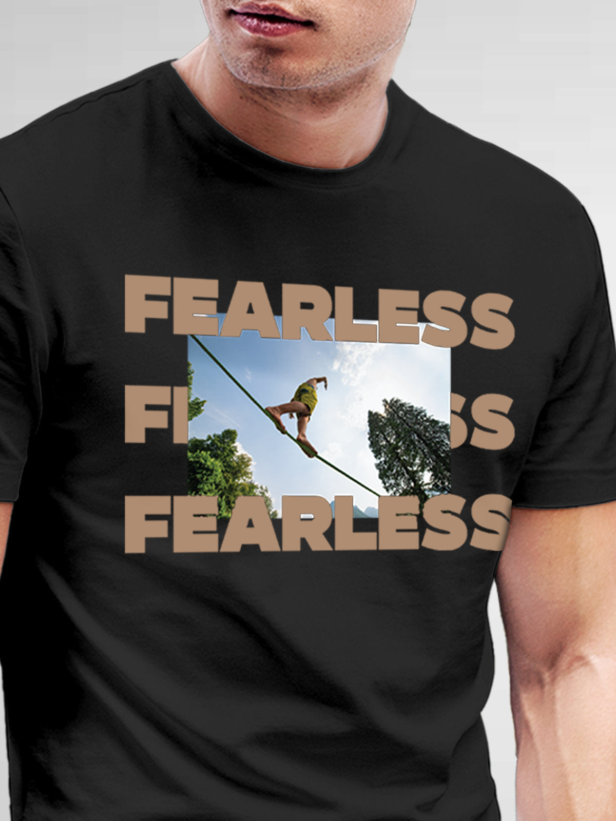 Close up of 'Fearless' design on Men's Dark Grey Round Neck T-shirt, highlighting intricate details and vibrant print.