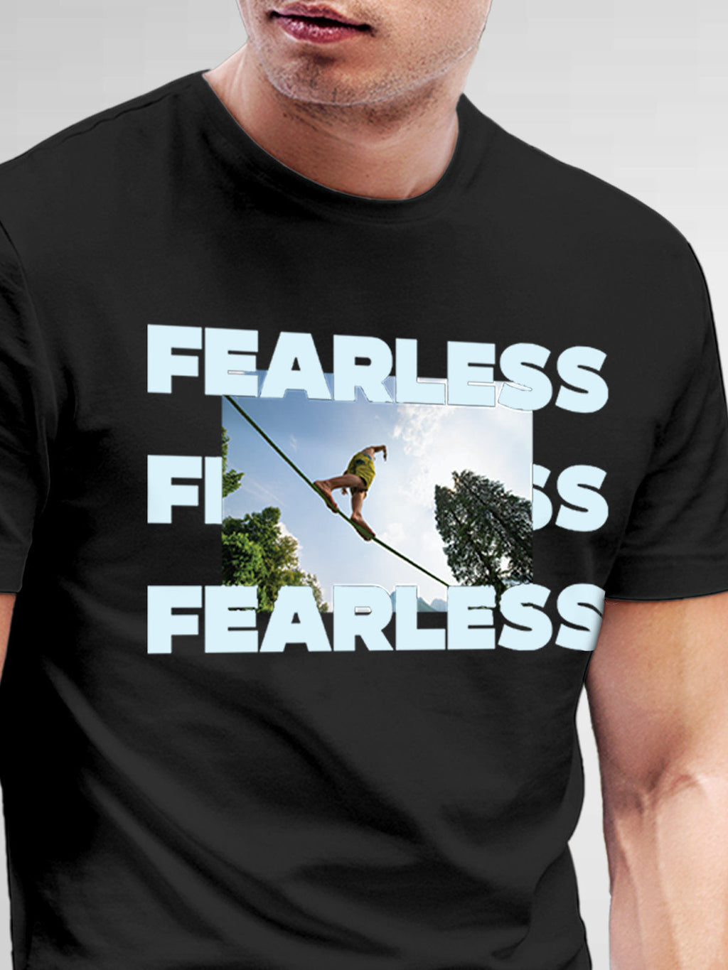 Close up of 'Fearless' design on Men's Dark Grey Round Neck T-shirt, highlighting intricate details and vibrant print.
