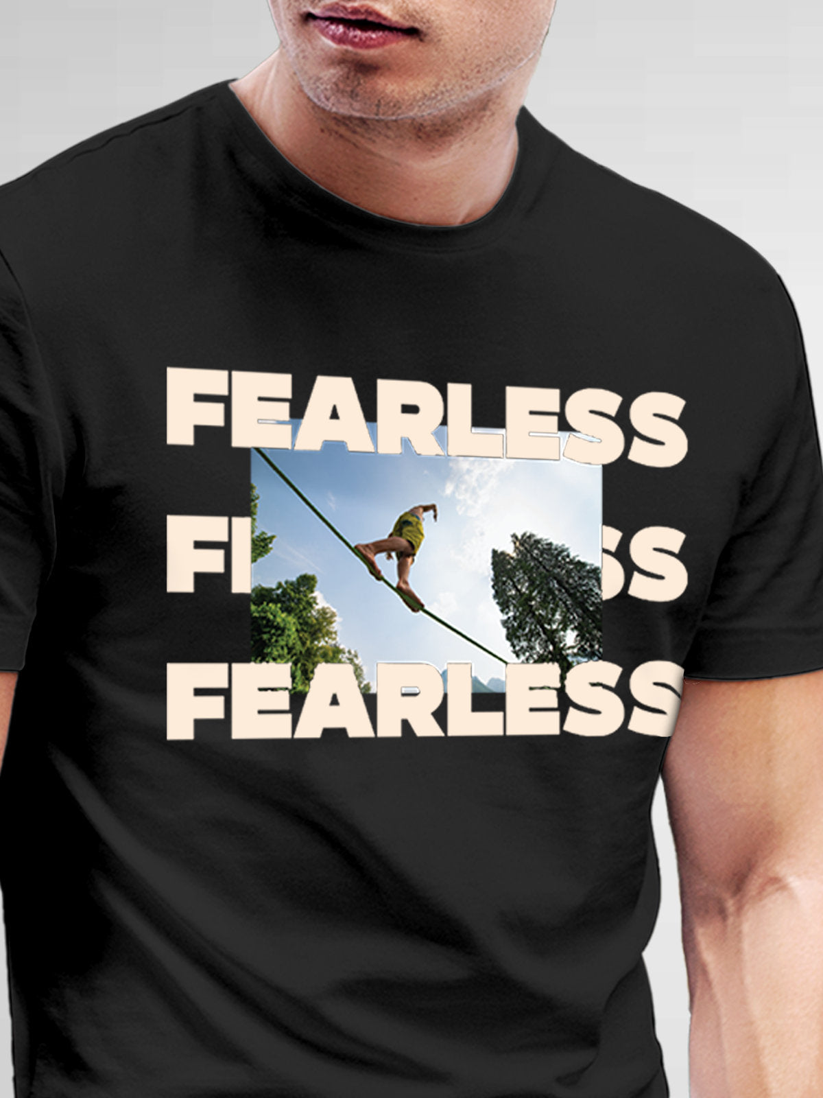 Close up of 'Fearless' design on Men's Dark Grey Round Neck T-shirt, highlighting intricate details and vibrant print.