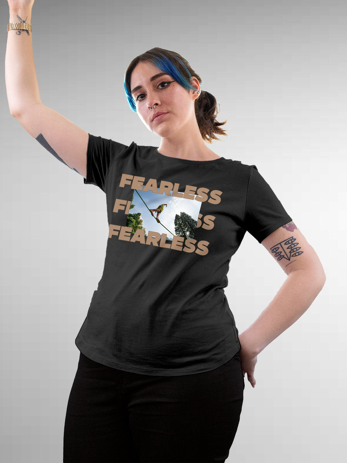 Model wearing Women's Dark Grey Round Neck T-shirt with 'Fearless' design, offering effortless style and premium comfort