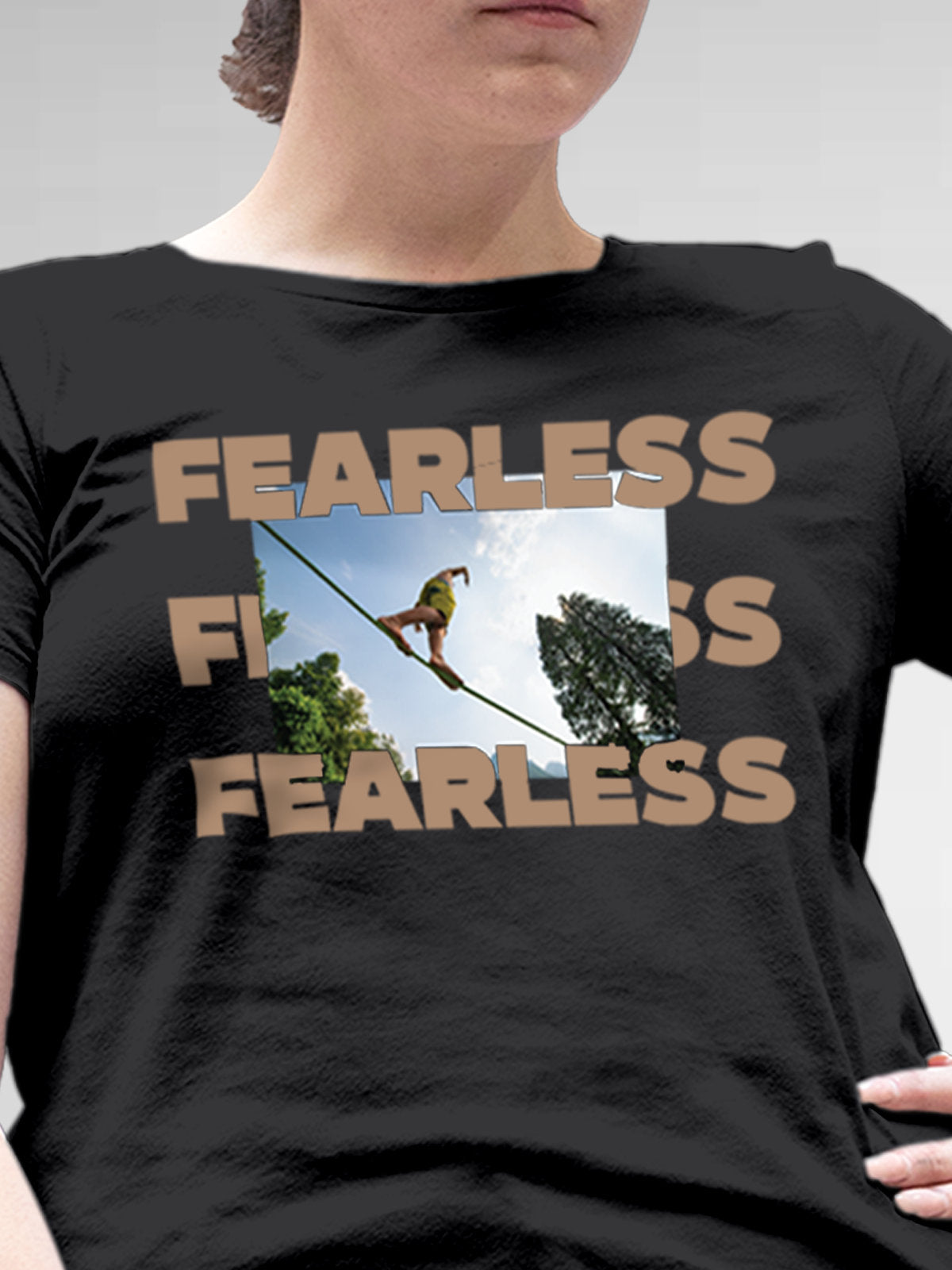 Close up of 'Fearless' design on Women's Dark Grey Round Neck T-shirt, highlighting intricate details and vibrant print.