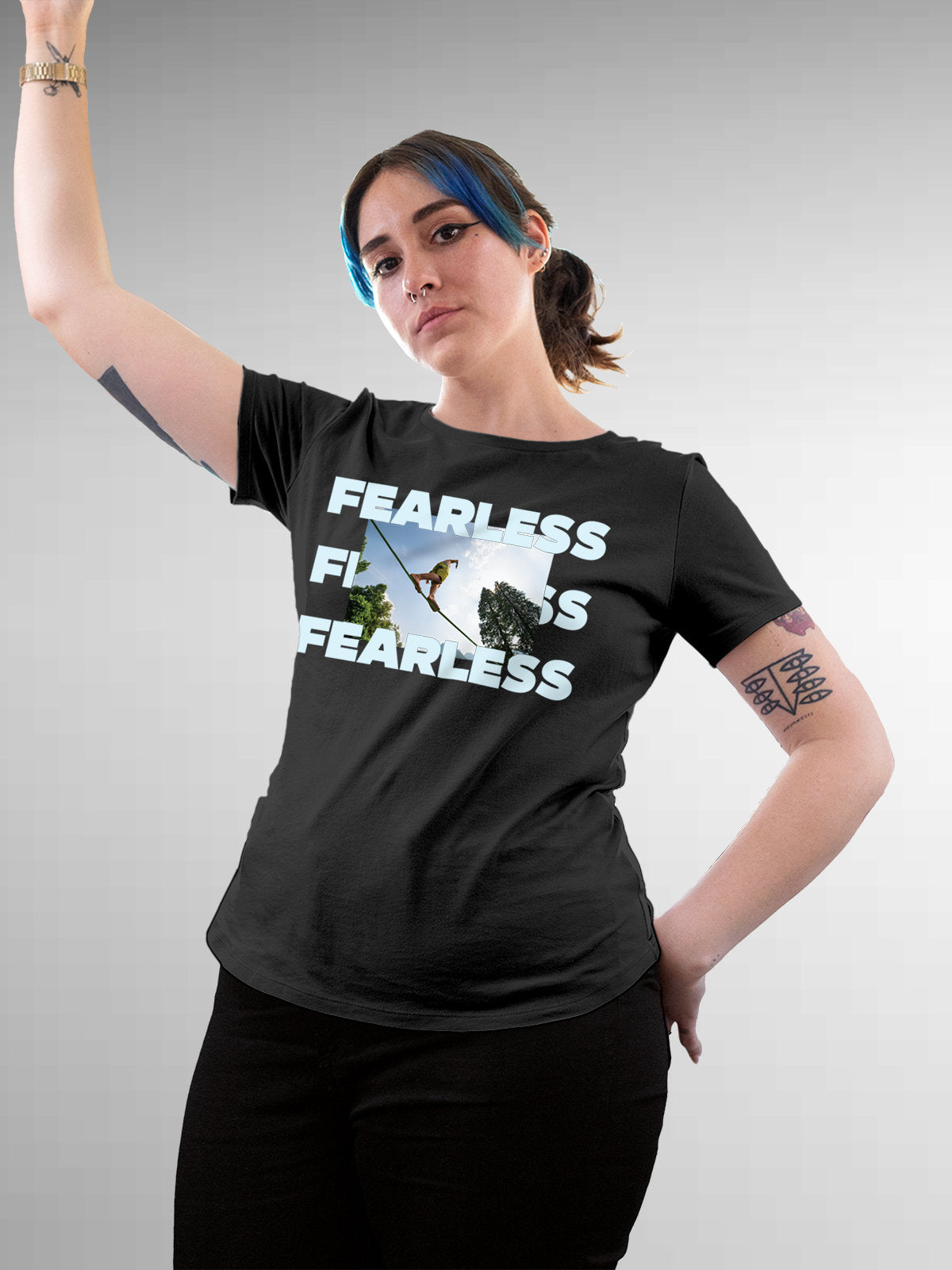 Model wearing Women's Dark Grey Round Neck T-shirt with 'Fearless' design, offering effortless style and premium comfort