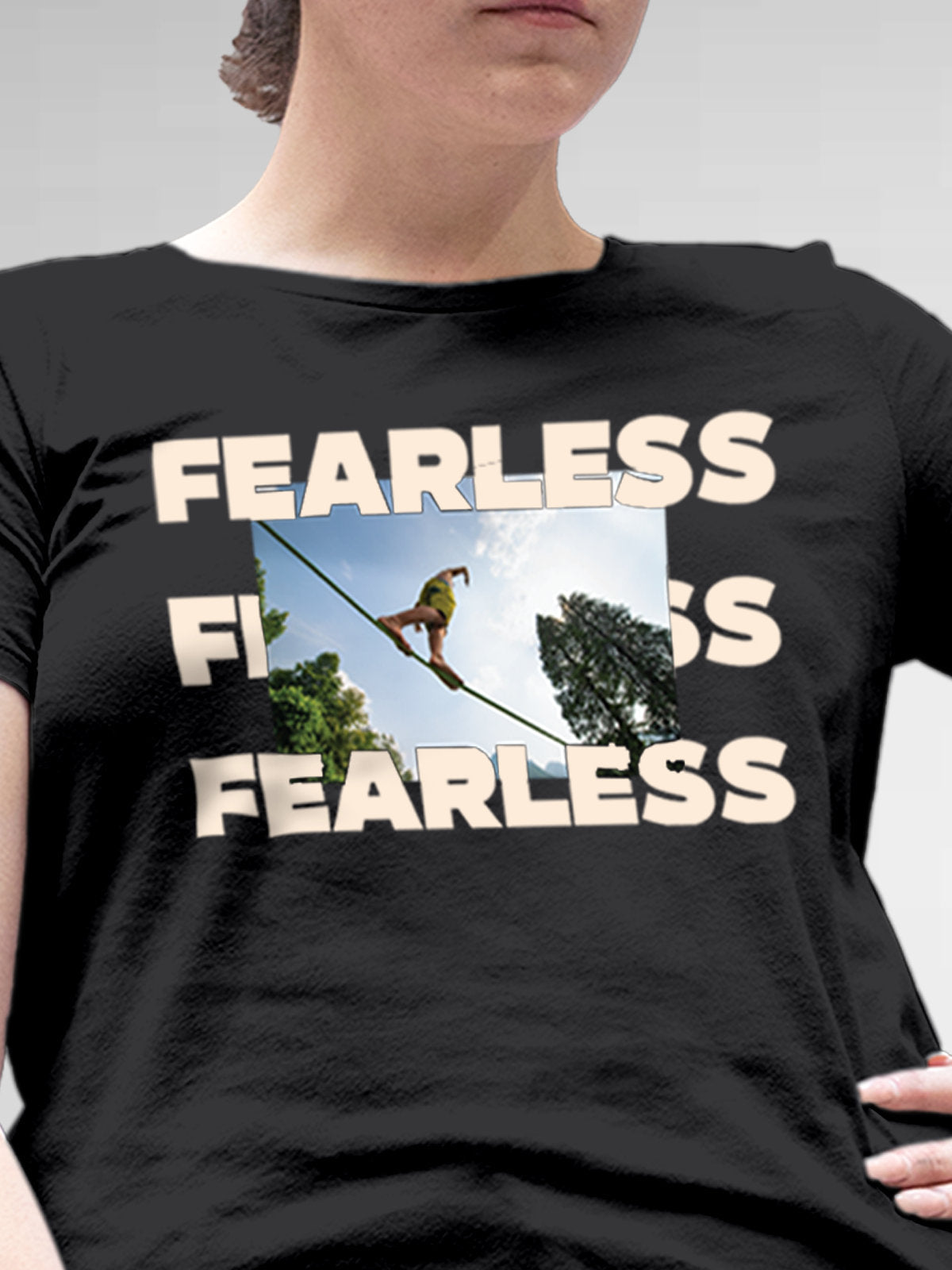 Close up of 'Fearless' design on Women's Dark Grey Round Neck T-shirt, highlighting intricate details and vibrant print.