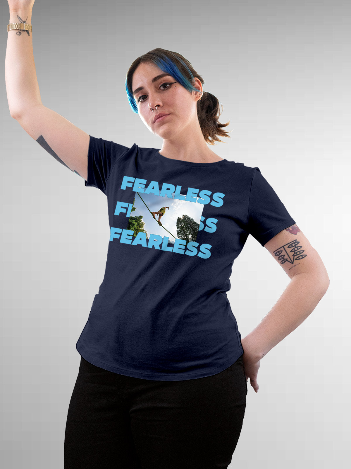 Model wearing Women's Navy Blue Round Neck T-shirt with 'Fearless' design, offering effortless style and premium comfort