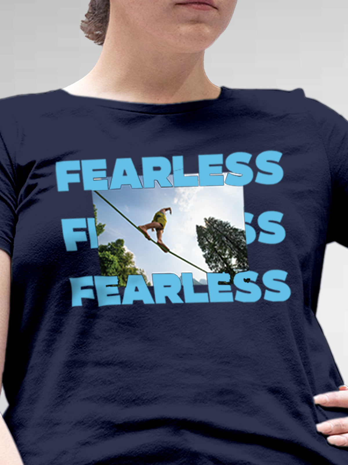 Close up of 'Fearless' design on Women's Navy Blue Round Neck T-shirt, highlighting intricate details and vibrant print.