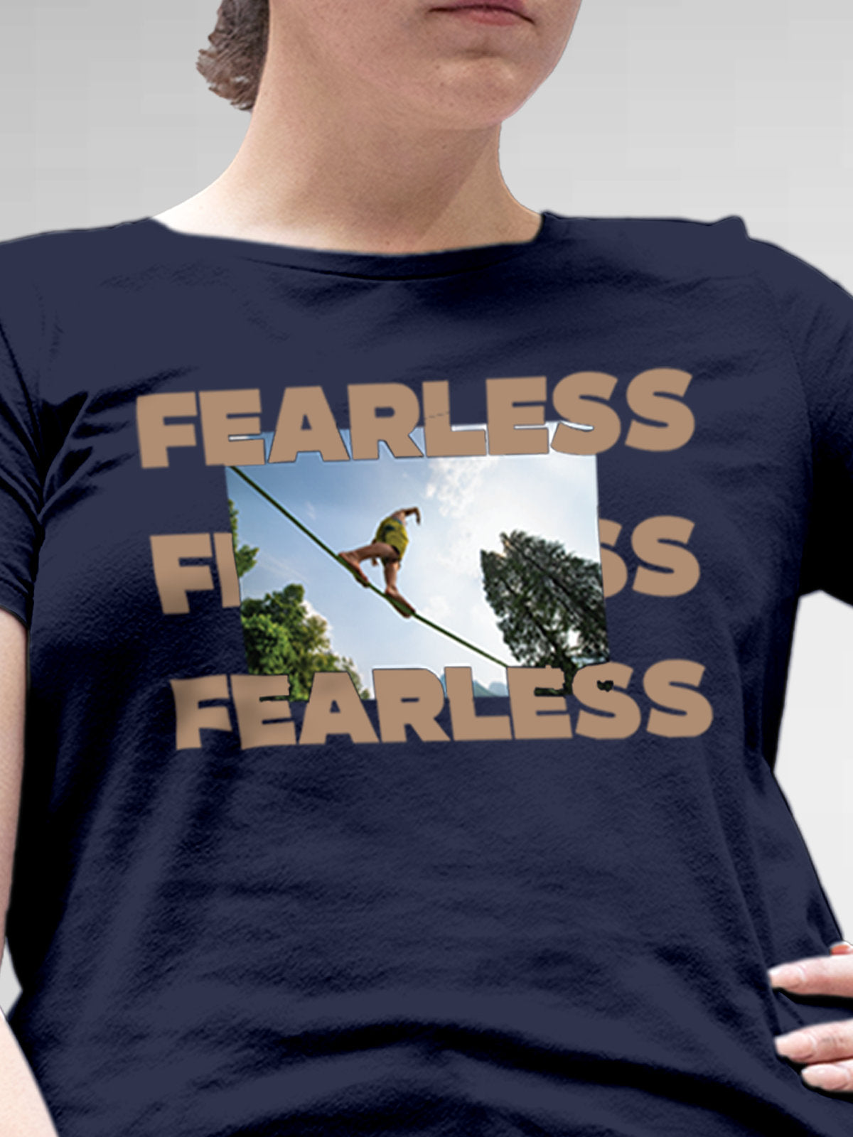 Close up of 'Fearless' design on Women's Navy Blue Round Neck T-shirt, highlighting intricate details and vibrant print.