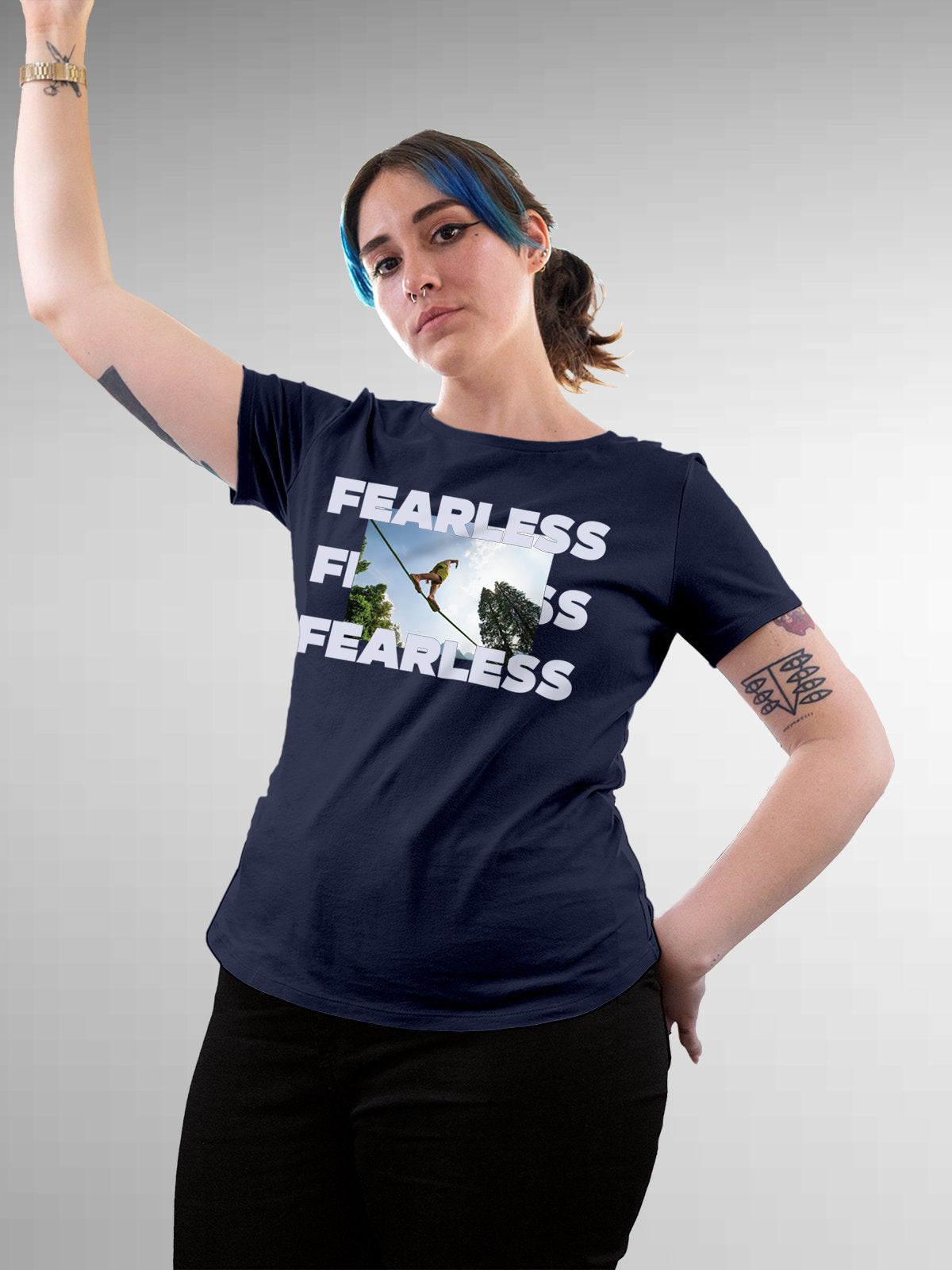 Model wearing Women's Navy Blue Round Neck T-shirt with 'Fearless' design, offering effortless style and premium comfort