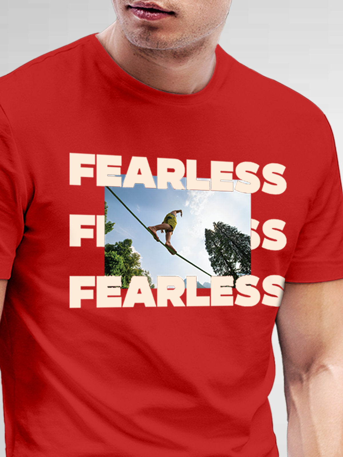 Close up of 'Fearless' design on Men's Red Round Neck T-shirt, highlighting intricate details and vibrant print.