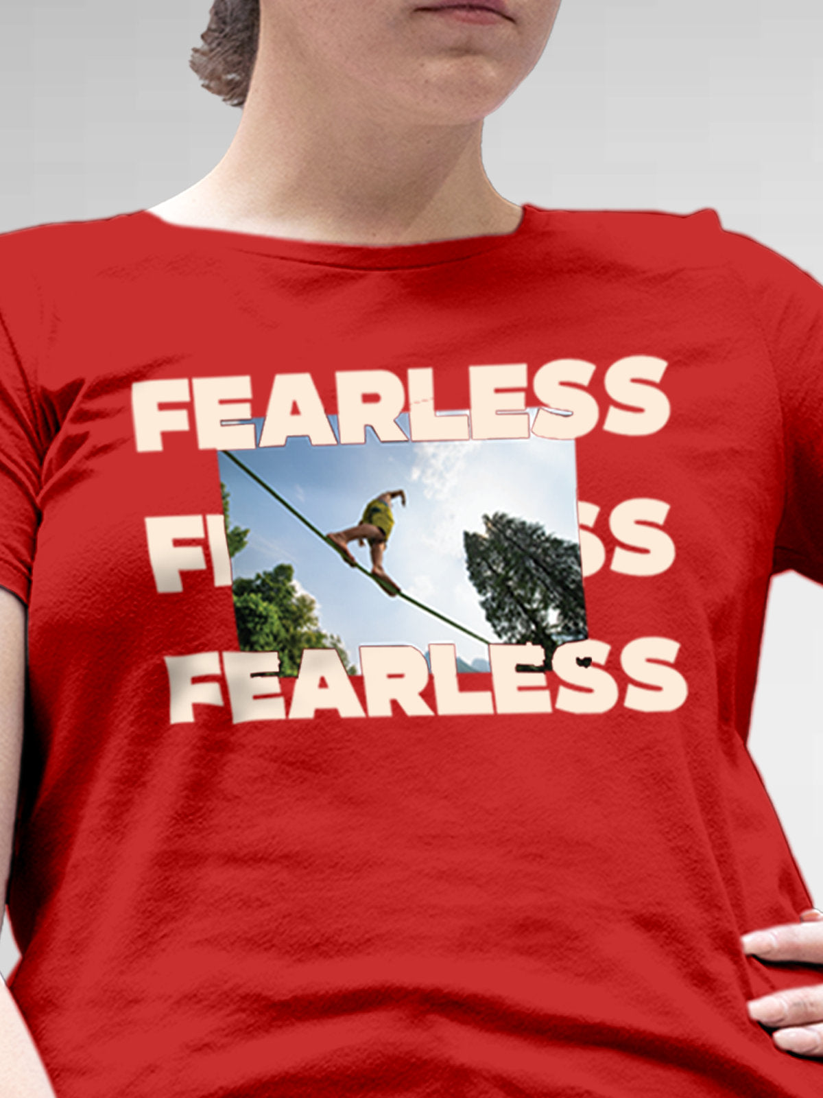 Close up of 'Fearless' design on Women's Red Round Neck T-shirt, highlighting intricate details and vibrant print.