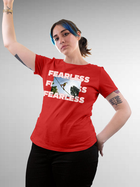 Model wearing Women's Red Round Neck T-shirt with 'Fearless' design, offering effortless style and premium comfort
