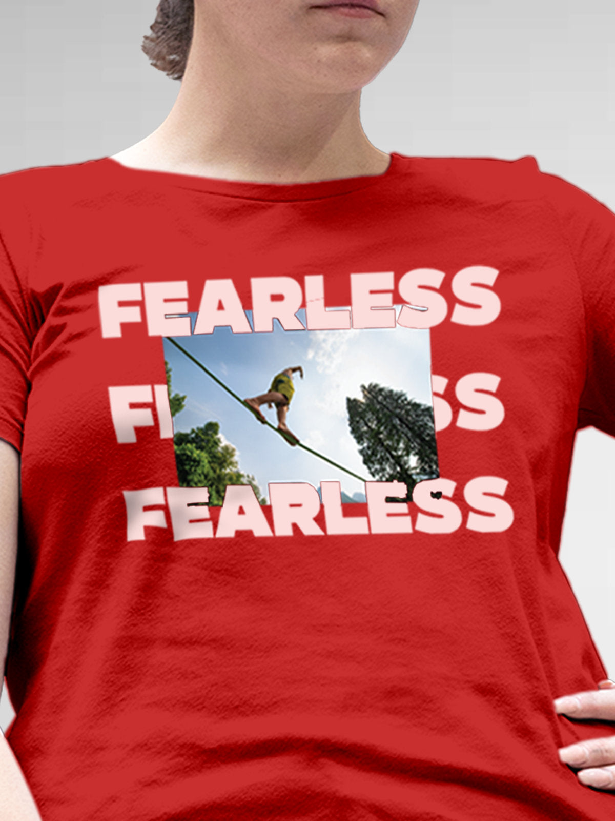 Close up of 'Fearless' design on Women's Red Round Neck T-shirt, highlighting intricate details and vibrant print.