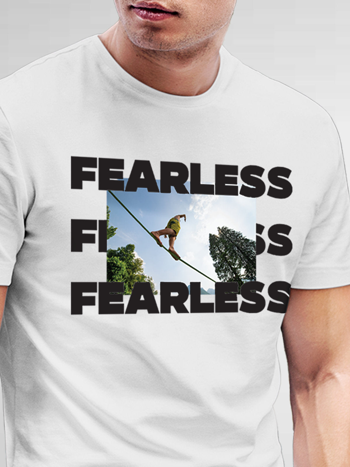 Close up of 'Fearless' design on Men's White Round Neck T-shirt, highlighting intricate details and vibrant print.