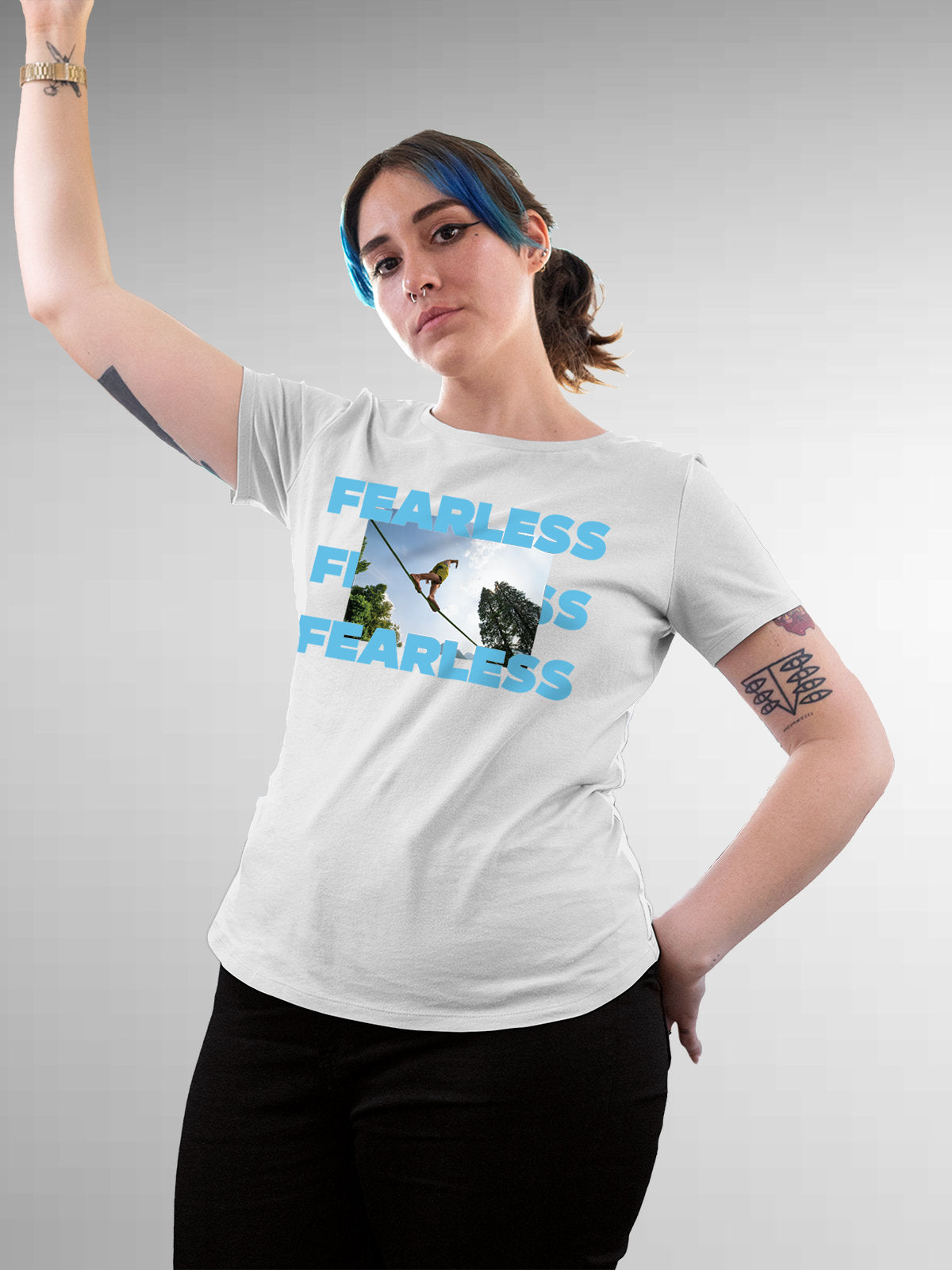 Model wearing Women's White Round Neck T-shirt with 'Fearless' design, offering effortless style and premium comfort