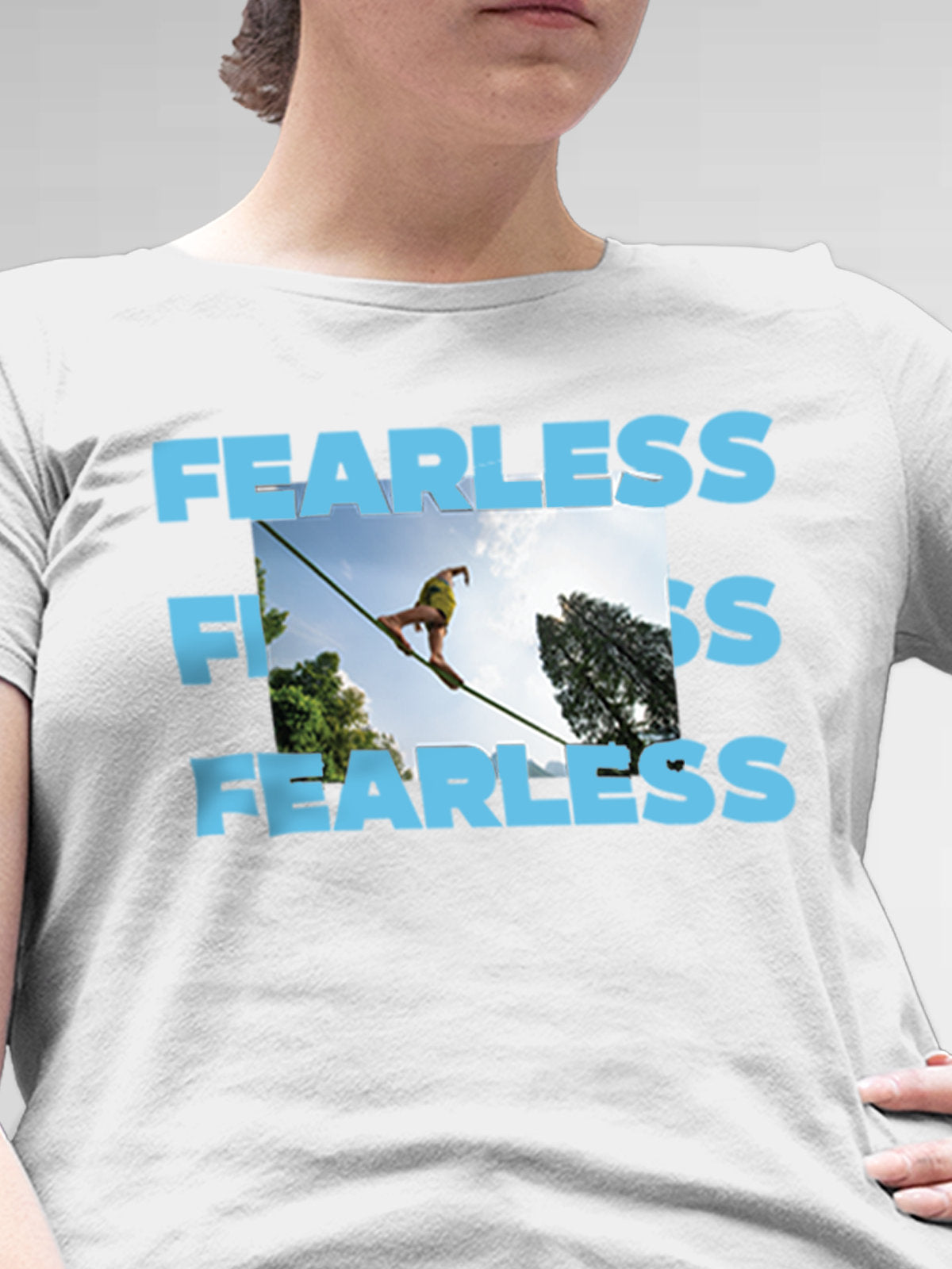 Close up of 'Fearless' design on Women's White Round Neck T-shirt, highlighting intricate details and vibrant print.