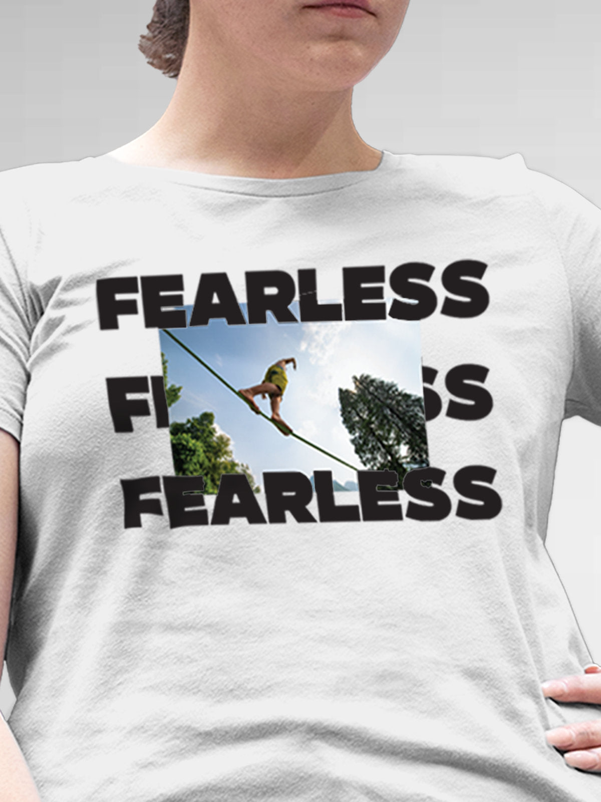 Close up of 'Fearless' design on Women's White Round Neck T-shirt, highlighting intricate details and vibrant print.
