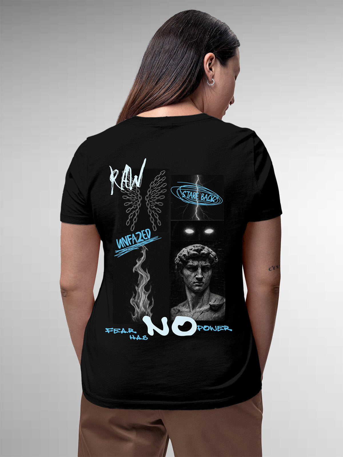 Model wearing Women's Black Round Neck T-shirt with 'Face The Fear' design, offering effortless style and premium comfort