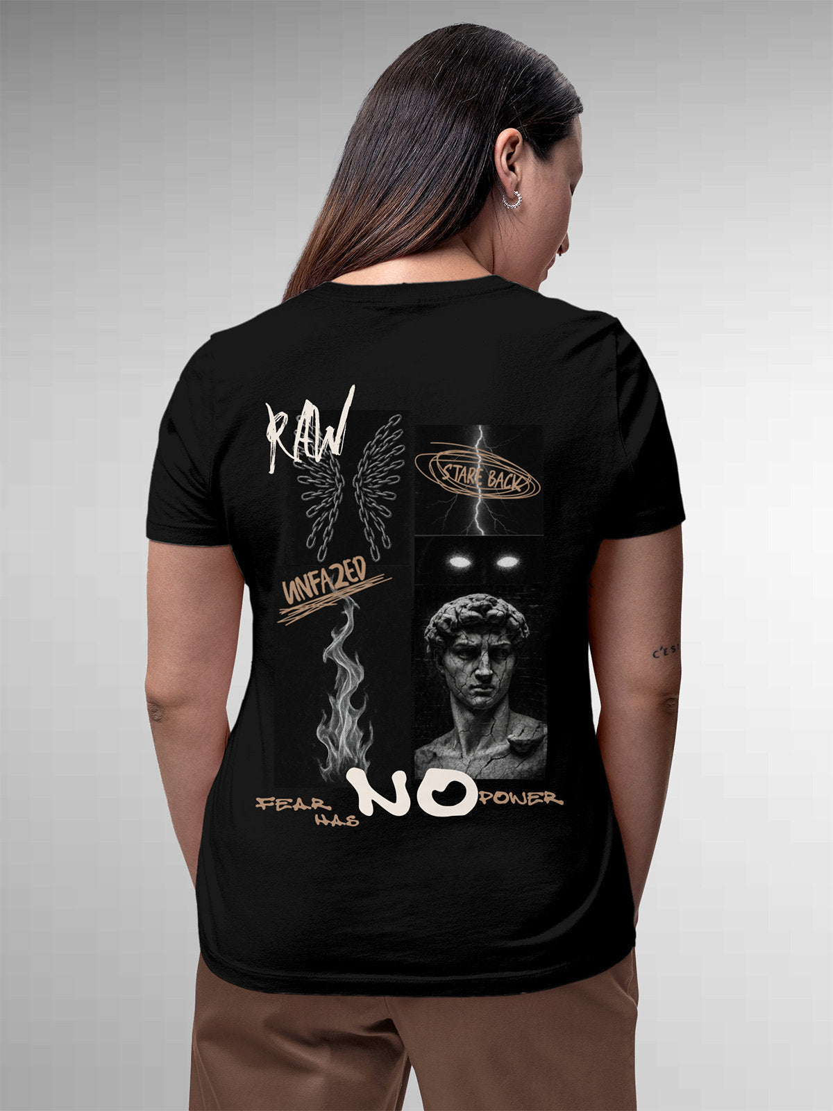 Model wearing Women's Black Round Neck T-shirt with 'Face The Fear' design, offering effortless style and premium comfort