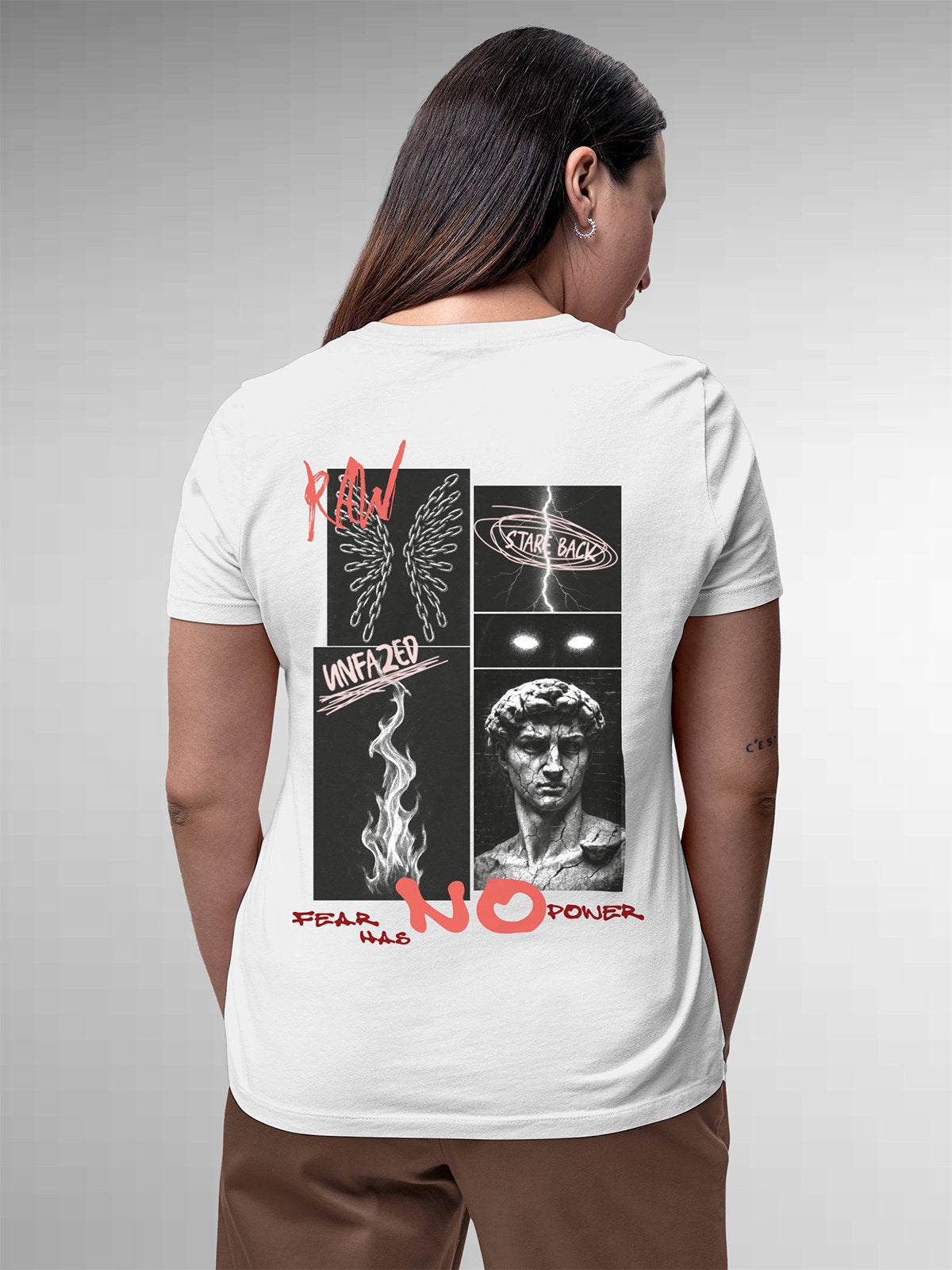 Model wearing Women's White Round Neck T-shirt with 'Face The Fear' design, offering effortless style and premium comfort