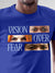 Close up of 'Vision Over Fear' design on Men's Blue Round Neck T-shirt, highlighting intricate details and vibrant print.