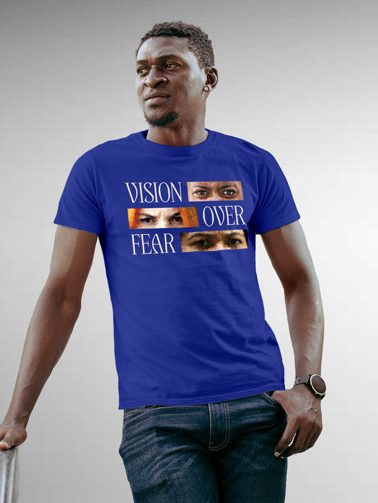 Fighterhero T-shirts: Model wearing Men's Blue Round Neck T-shirt with 'Vision Over Fear' design