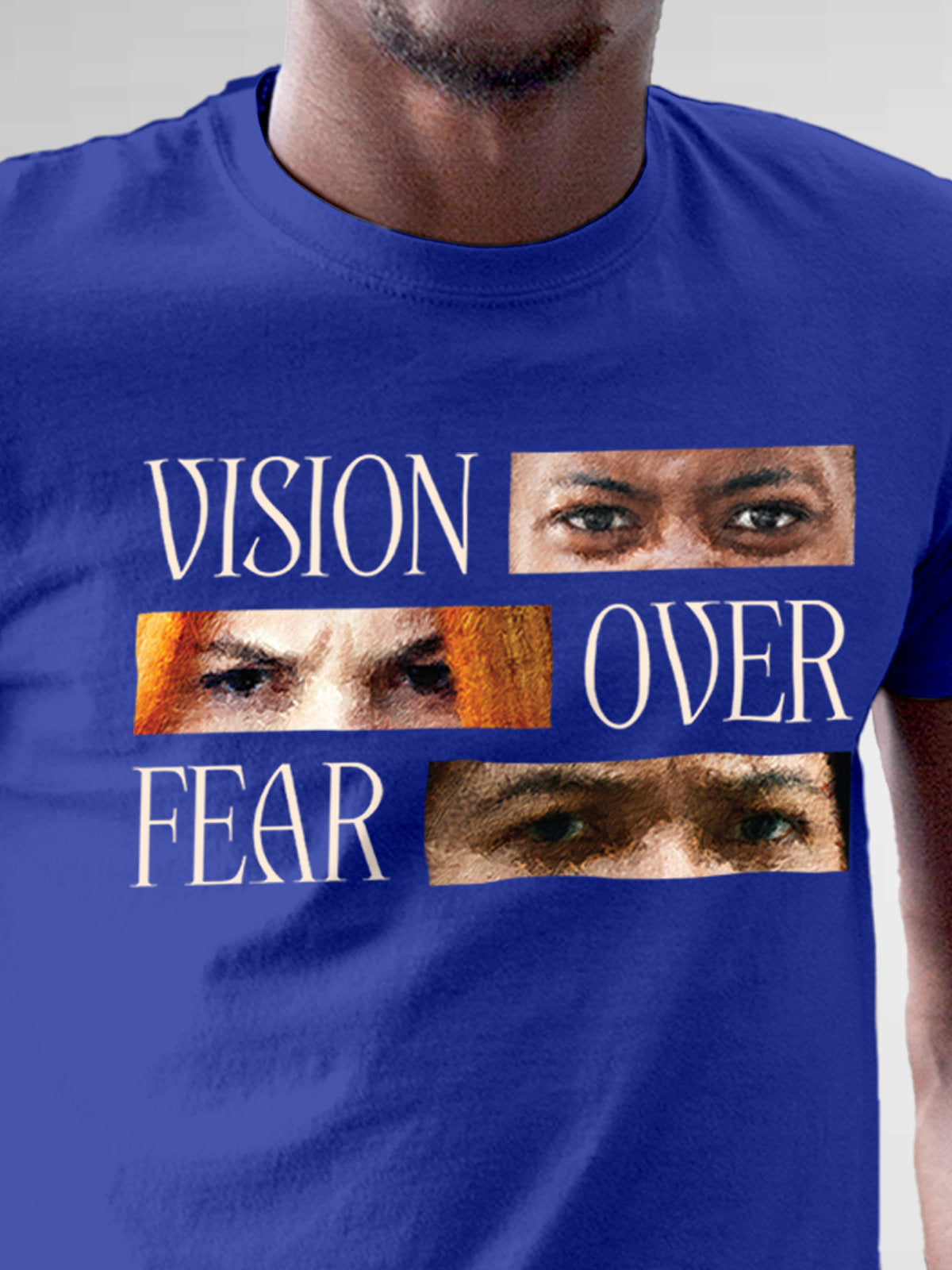 Close up of 'Vision Over Fear' design on Men's Blue Round Neck T-shirt, highlighting intricate details and vibrant print.