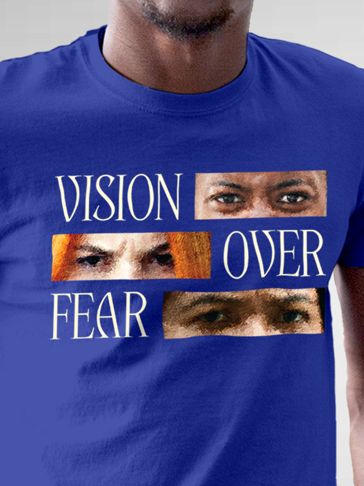 Close up of 'Vision Over Fear' design on Men's Blue Round Neck T-shirt, highlighting intricate details and vibrant print.