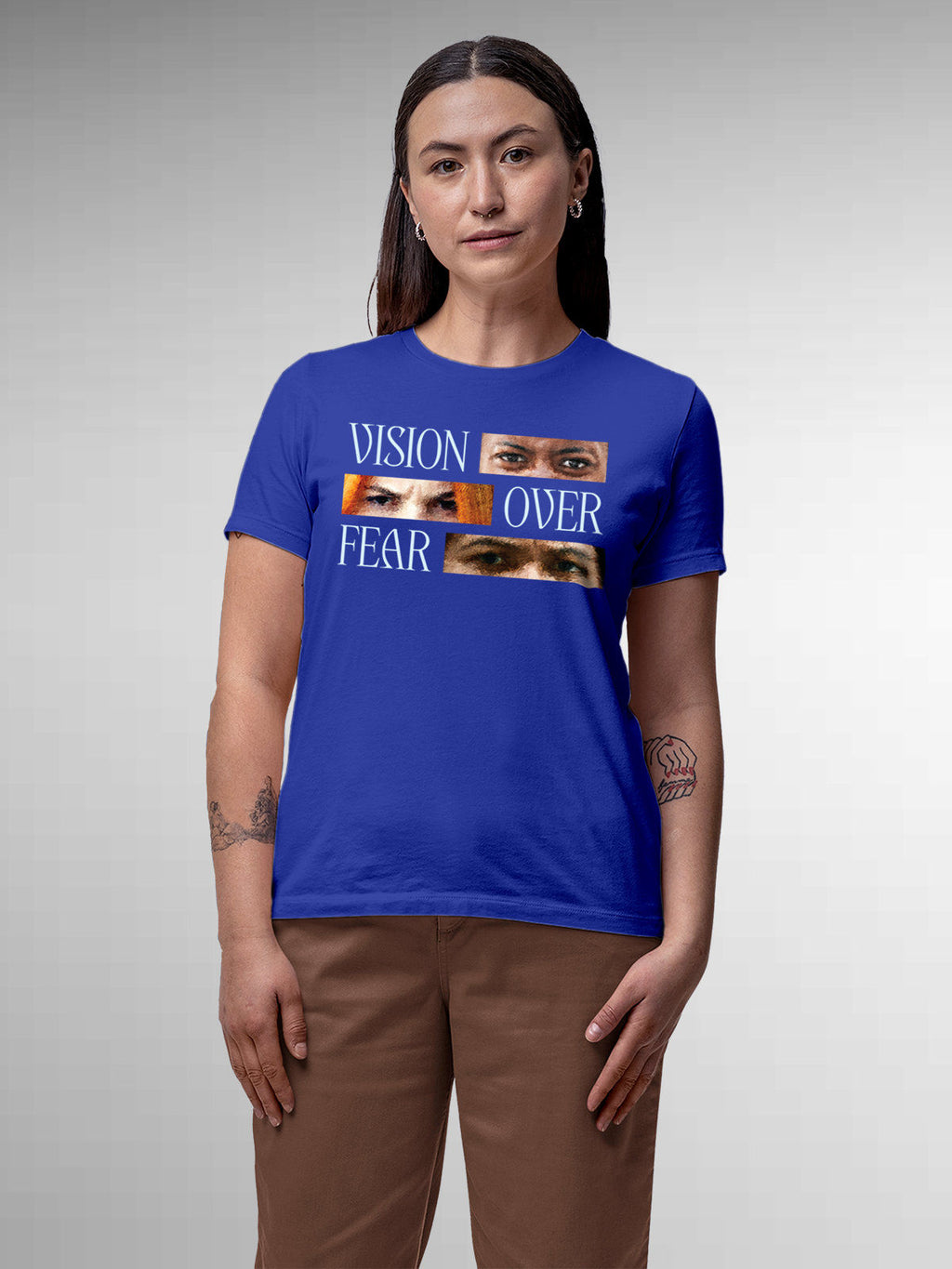 Model wearing Women's Blue Round Neck T-shirt with 'Vision Over Fear' design, offering effortless style and premium comfort