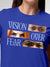 Close up of 'Vision Over Fear' design on Women's Blue Round Neck T-shirt, highlighting intricate details and vibrant print.