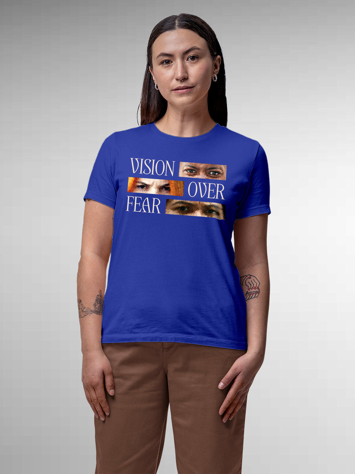 Model wearing Women's Blue Round Neck T-shirt with 'Vision Over Fear' design, offering effortless style and premium comfort