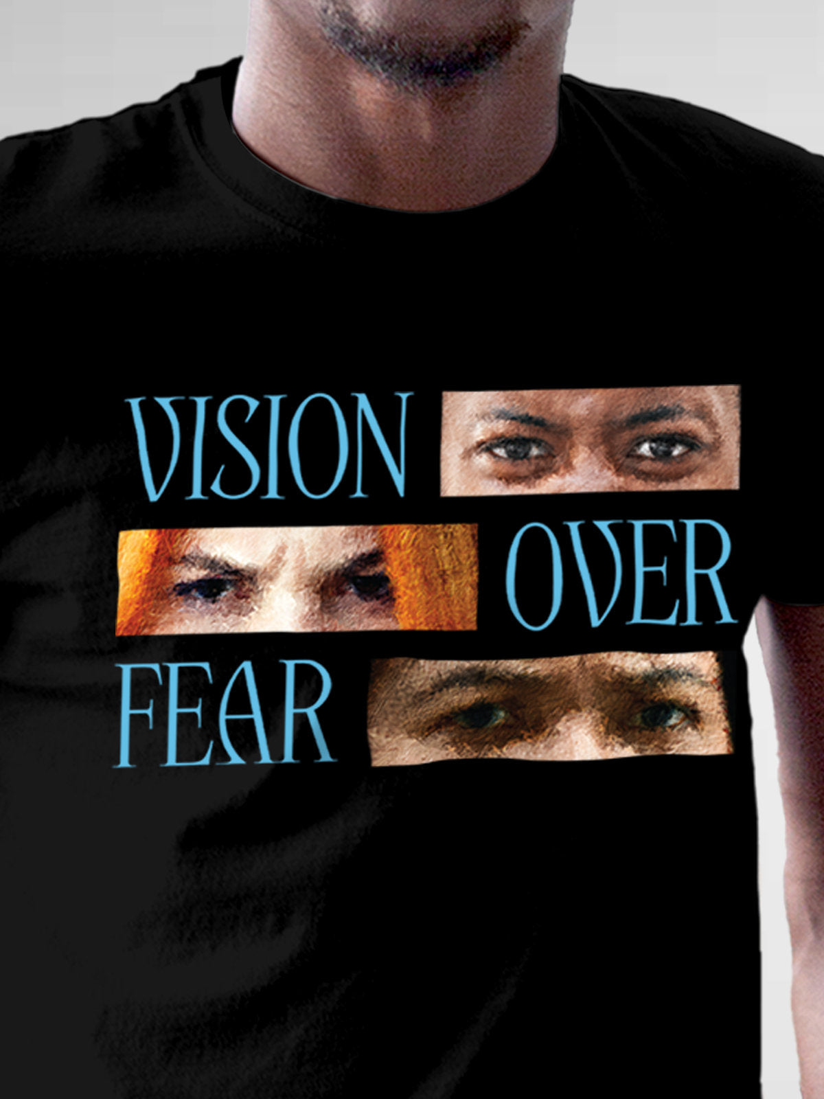 Close up of 'Vision Over Fear' design on Men's Black Round Neck T-shirt, highlighting intricate details and vibrant print.